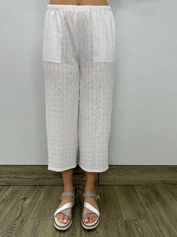 Retro bell-bottom pants for 70s-inspired fashion -White Capri with Side Slit