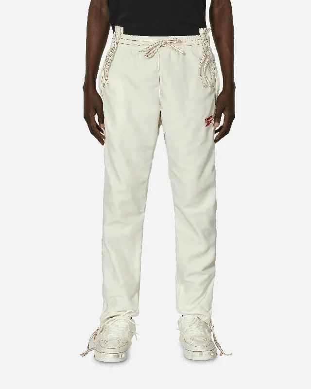 Stylish flare pants for retro party looks -KANGHYUK Track Pants White