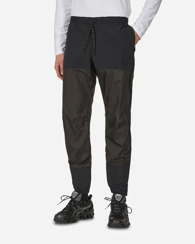 Weather-resistant pants for unpredictable climate needs -Ultralight DWR Paneled Track Pants Black